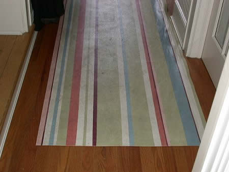 Well used floor cloth. 