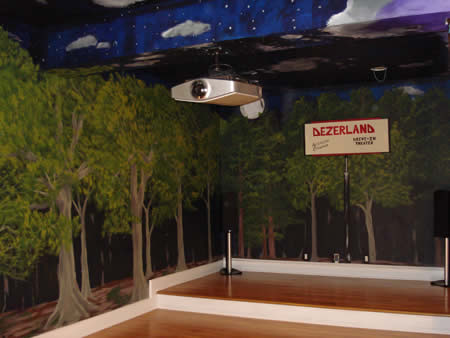 Night sky/ trees drive-in theatre themed screening room.