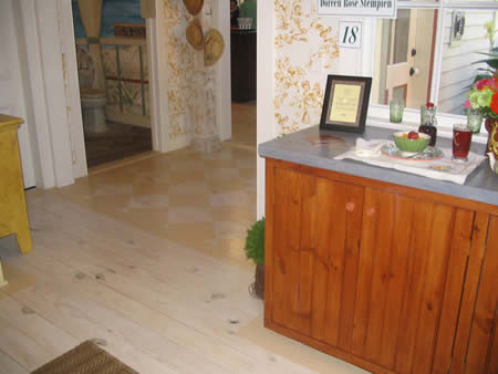 Painted floor, faux stone countertop (very durable!).  Nothfork Designer Show House, Jamesport, NY